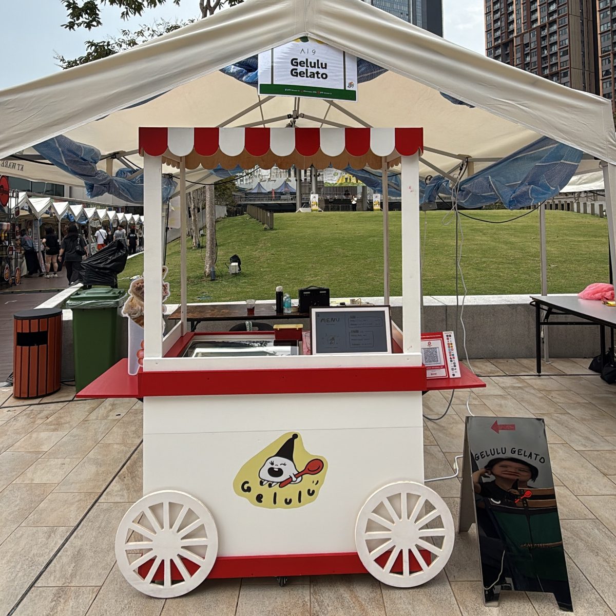 The Gelulu gelato cart under a canopy at an outdoor event